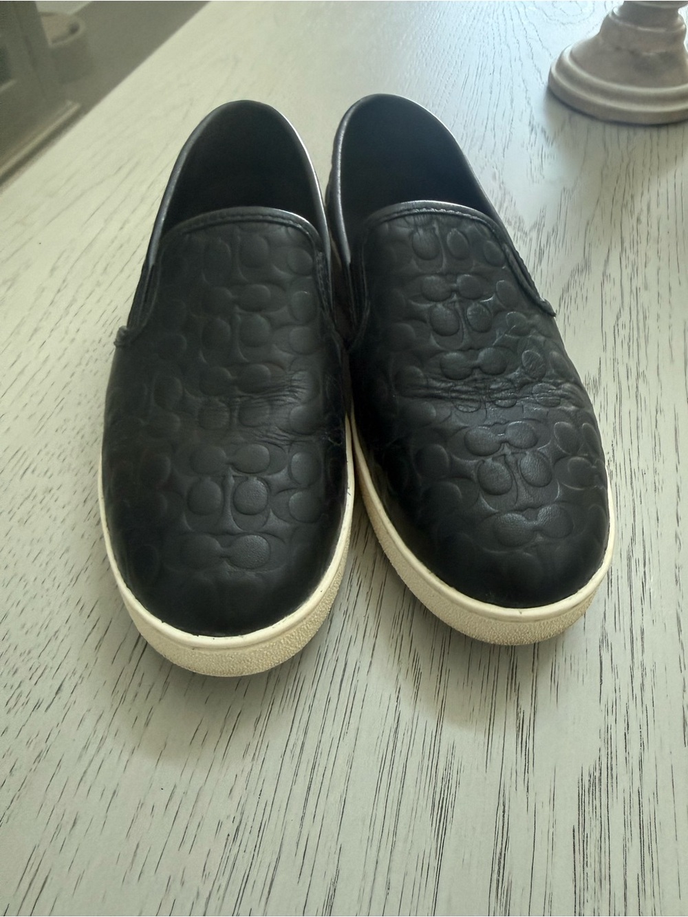 Coach Black Embossed Leather Slip-On Sneakers with White Soles